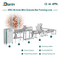 Ligne de production automatique de barres granola, extrudeuse de barres protéinées aux céréales et au chocolat, machine à fabriquer des barres énergétiques aux dattes et au sésame