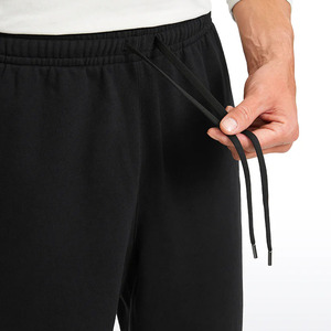Pantalones deportivos de cintura media, antiarrugas, suaves, de secado rápido para hombre, pantalones deportivos clásicos para hombre con tela transpirable y de ajuste relajado. - Product Image 2