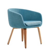 Fauteuil lounge jaune en tissu tissé texturé avec pieds courbés en bois, idéal pour café, négociation ou comme chaise d'invité