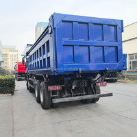 Самосвал SINO HOWO NX 8x4 для тяжелых условий эксплуатации с кузовом дугообразной формы, обеспечивающий минимальное остаток материала в кузове, для горнодобывающей промышленности