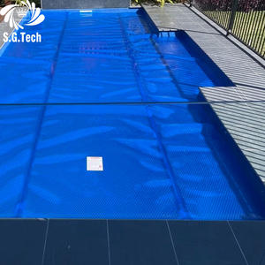 Couverture de <span class=keywords><strong>piscine</strong></span> enroulable isolante, anti-poussière et portable, fabriquée en film PE de haute qualité, adaptée aux piscines. - Product Image 1