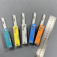 Couteau de poche multifonction 9 en 1 avec lime, ciseaux, lame de scie, ouvre-bouteille, tournevis, revêtement en titane, couteau suisse, poignée en ABS
