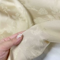Tissu en satin jacquard cupro tendance à motif floral unique, prêt à l'emploi, pour robes, vêtements et textiles de maison pour femmes et hommes