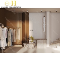Aménagement intérieur de magasin de vêtements, présentoir à vêtements en métal sur mesure, comptoir de vente au détail, mobilier moderne pour magasin de vêtements