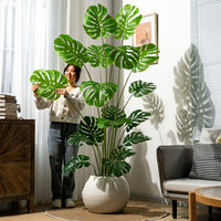 Plante artificielle Monstera Deliciosa, feuillage vert brillant, pot blanc, style Japandi Scandi, décoration naturelle pour salon, plante artificielle Monstera en gros