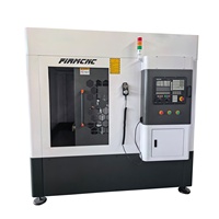 Machine de fraisage et de gravure CNC à changement d'outil automatique 4040 6060 6090 pour moules en aluminium et en métal