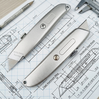 Couteau utilitaire rétractable en métal robuste |   Cutter en alliage d'aluminium avec verrou de sécurité |   Outil de coupe professionnel