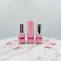 Tube de rouge à lèvres en plastique vide, logo personnalisé en gros, joli nœud rose, tube de baume à lèvres cosmétique