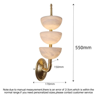 Applique murale LED de luxe en albâtre espagnol, laiton et marbre naturel pour éclairage d'ambiance intérieur de hôtels, villas et couloirs