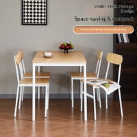 Vente directe usine : Ensemble table et chaises de salle à manger rectangulaire moderne et minimaliste en acier et bois, quatre places, avec espace de rangement compact