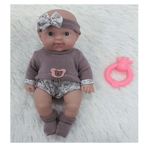 Poupées reborn en vinyle pour bébé garçon en silicone véritable fait à la main de 10 pouces, peintes de manière réaliste, kits de vêtements pour nouveau-nés - Product Image 1