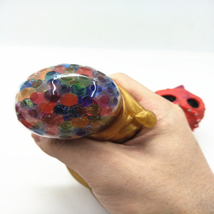 Venta al por mayor de fábrica: Pelotas antiestrés de dinosaurio de alta calidad, personalizables, de malla, para aliviar el estrés, y pelotas de uva para apretar. - Product Image 1