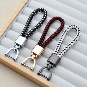 Porte-clés créatif en cuir tressé, porte-clés de voiture transfrontalier en métal, pendentif de sac à fermoir mors, petit cadeau personnalisé - Product Image 4