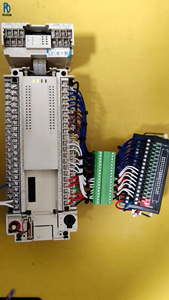 FX2N-64MR-001 PLC ตัวควบคุมลอจิกแบบตั้งโปรแกรมได้ โมดูลควบคุมอุตสาหกรรม ถอดประกอบแล้ว ทดสอบการทำงานของฟังก์ชันการเขียนโปรแกรมอย่างเต็มที่แล้ว - Product Image 1