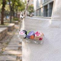 Porte-clés pendentif patte de chat colorée et mignonne, jouet anti-stress imprimé patte de chat, clavier à boutons pour sac à dos