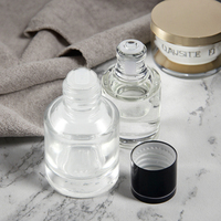 Flacon diffuseur en verre transparent de luxe personnalisé avec bouchon à vis noir imprimé à l'écran pour huiles essentielles