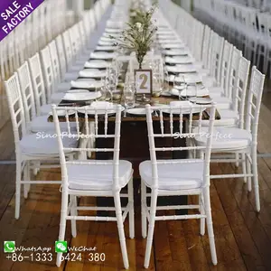 Suministros de decoración de boda a precio de fábrica, sillas modernas apilables de acero dorado para bodas, phoenix