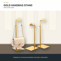 Expositor de Bolsos de Mano Personalizado en Dorado con Base Metálica de Altura Ajustable para Joyería, Boutique y Mostrador de Venta