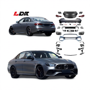Kit carrosserie pour <span class=keywords><strong>Mercedes</strong></span> Benz Classe E W213 2016-2020 Mise à jour vers le style <span class=keywords><strong>E63</strong></span> <span class=keywords><strong>AMG</strong></span> 2024 avec pare-chocs de qualité OEM Phare Emark - Product Image 1