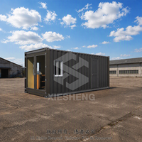 Conteneur de Garde et de Surveillance Modulaire Préfabriqué de 20 pieds avec Bureau, Étagère et Isolation pour Entrée de Cour d'Entreposage