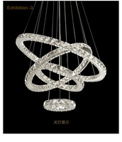 Lustre de salon en cristal multi-anneaux personnalisé, lumière circulaire moderne, luxe créatif, lampe suspendue en cristal pour hall duplex