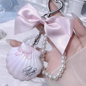 Flower Knows Shell's Jewel Bag Colgante de Concha con Lazo, Crema Iluminadora, Piedra Lunar, Lágrimas Azules, Tridimensional, Nacarado - Product Image 2