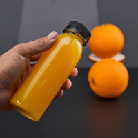 Bouteilles de jus en plastique 2oz 4oz 8oz 12oz 16oz Bouteille de jus ronde vide en plastique PET avec logo personnalisé de film rétractable