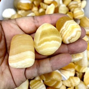 <span class=keywords><strong>Pietra</strong></span> burattata di <span class=keywords><strong>Calcite</strong></span> arancione di Spar islandese di miele giallo all'ingrosso in vendita - Product Image 2