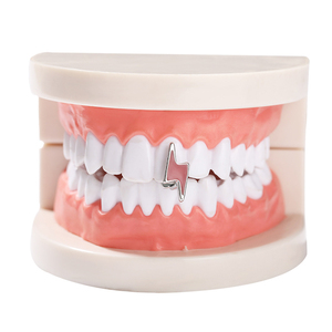 Fantaisie Jour Blues Nouveau Style Dents Simples Grillz Coloré Rouge Vert Foudre pour Hommes Femmes Corps En Alliage Plaqué Or 18K pour Cadeaux - Product Image 1