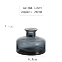 Bouteilles en verre rondes en gros pour flacons de parfum vides de 150 ml et 200 ml, avec remplissage de parfum en verre.