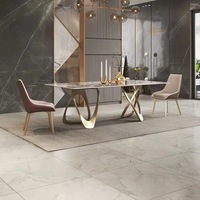 Table à manger rectangulaire moderne en marbre avec base double en acier inoxydable doré, mobilier de luxe pour villa, hôtel, appartement