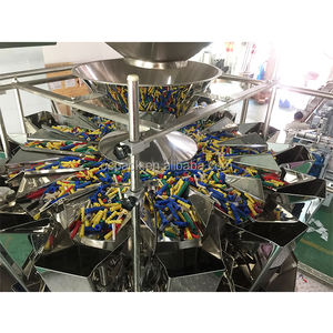 Machine d'emballage pour plaques de noix d'arec avec alimentation par vibrateur - Product Image 2