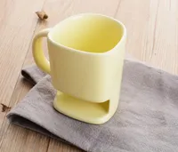 Mug à café en céramique en forme de visage humain avec compartiment pour biscuits et gâteaux