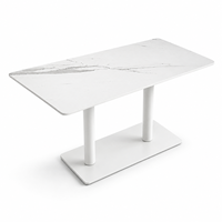 Table de restaurant, plateau en pierre frittée avec base à double colonne blanche et design de table aux coins arrondis pour hôtel et café