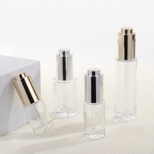 Flacon compte-gouttes en verre vide pour huile essentielle pour les yeux, 10 <span class=keywords><strong>ml</strong></span>, 15 <span class=keywords><strong>ml</strong></span>, 20 <span class=keywords><strong>ml</strong></span>, 30 <span class=keywords><strong>ml</strong></span>, avec bouton poussoir hydraulique doré ou argenté - Product Image 1