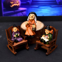 Décoration artisanale en résine mignonne de sorcière et fantôme d'Halloween sur chaise à bascule