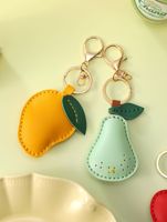 Porte-clés de luxe exquis et durable en forme de petit fruit, design mignon citron cerise, imprimé en typographie, pendentif en cuir PU, accessoire de sac pour