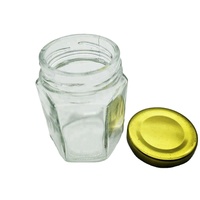 Cina 110 Ml Bening Toples Kaca Segi Enam dengan Tutup Logam untuk Madu