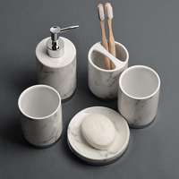 Ensemble d'accessoires de salle de bain en céramique motif marbre porte-savon distributeur de savon liquide porte-brosse à dents ensemble de salle de bain de toilette d'hôtel