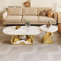 Table basse convertible moderne de luxe léger avec plateau en ardoise et structure en acier, design minimaliste pour salon