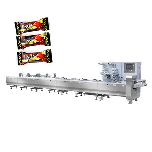 Máquina de embalagem de barras de cereais Máquina de embalagem de doces de amendoim Máquina de embalagem de barras de cereais