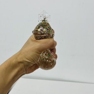 Entrepôt USA : Lot de 72 jouets de Noël scintillants 4 couleurs, en forme d'arbre, rembourrés au maltose, à remontée lente, anti-stress, avec boîte - Product Image 6