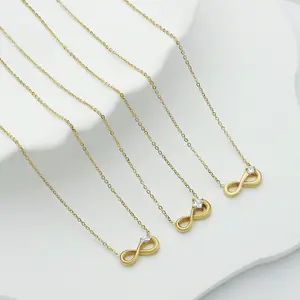 Sıcak kişiselleştirilmiş çift çapraz altın kaplama paslanmaz çelik mücevher kolye kızlar Infinity sembol kolye