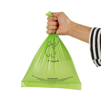 Fábrica al por mayor 100% compostable EN13432 PLA PBAT almidón de maíz biodegradable bolsas para caca de perro con logotipo para productos para el hogar
