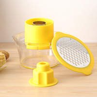Batteuse à maïs manuelle multifonctionnelle Râpe à carottes en acier inoxydable Éplucheur et rabot Hachoir à fruits et légumes