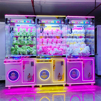 Machine à pince à poupées commerciale très populaire, entièrement transparente, grande, en plastique, avec construction robuste, à monnayeur, pour aire de jeux, dotée d'un clip de suspension, garantie 1 an