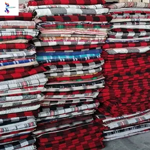 China stock market wholesale above 1m length yarn dyed flannel cutting pieces checks shirts fabric leftover stock in shaoxing