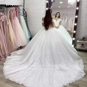 فستان زفاف حديث بكتف مكشوف من الدانتيل تشكيلة 2025 الجديدة أنيق ورفيع بدون أكمام برباط وذيل طويل للعروس - Product Image 2