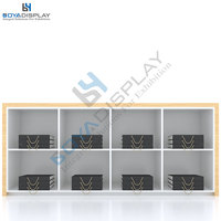 Présentoir de tapis métallique multi-niveaux incliné, grande capacité, personnalisé, directement d'usine, design moderne et minimaliste, hauteur réglable