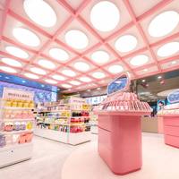 Ensemble de meubles de présentation pour magasin de cosmétiques personnalisés, kiosque rond rose pour la présentation des rouges à lèvres, décoration intérieure pour boutique de maquillage